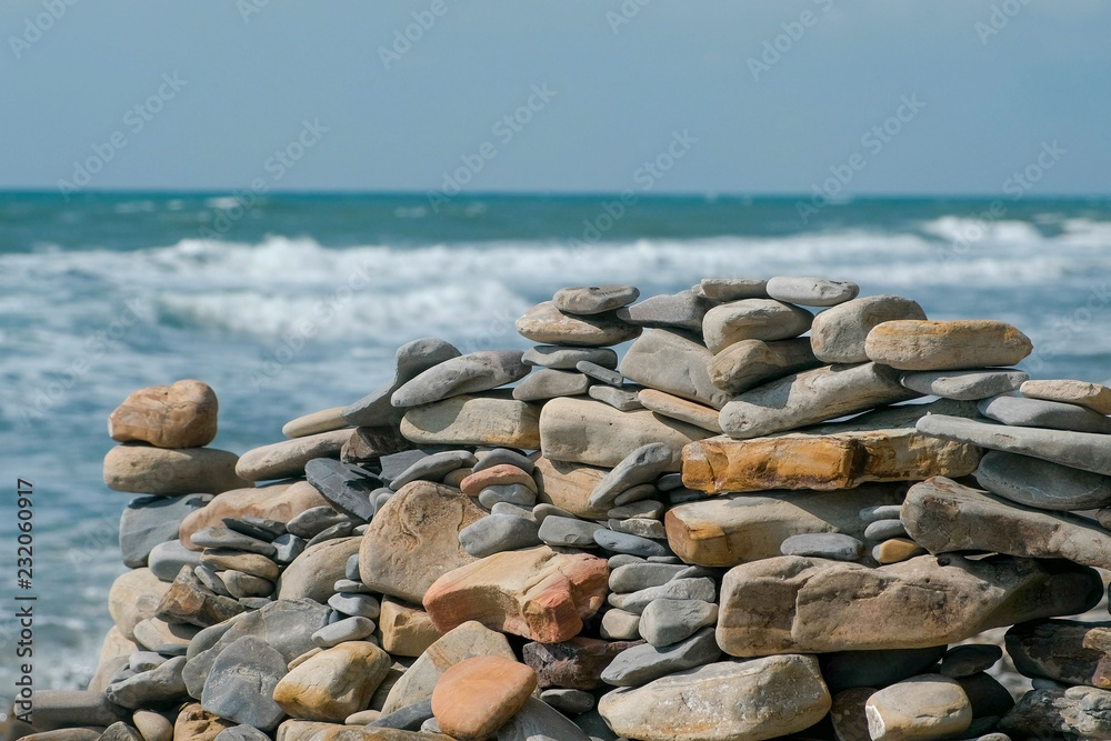 Wall of stones on the sea shore beach. Wall of stones on the sea shore beach.