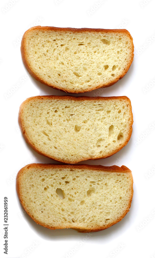 Sliced white bread lying on white background Sliced white bread lying on white background
