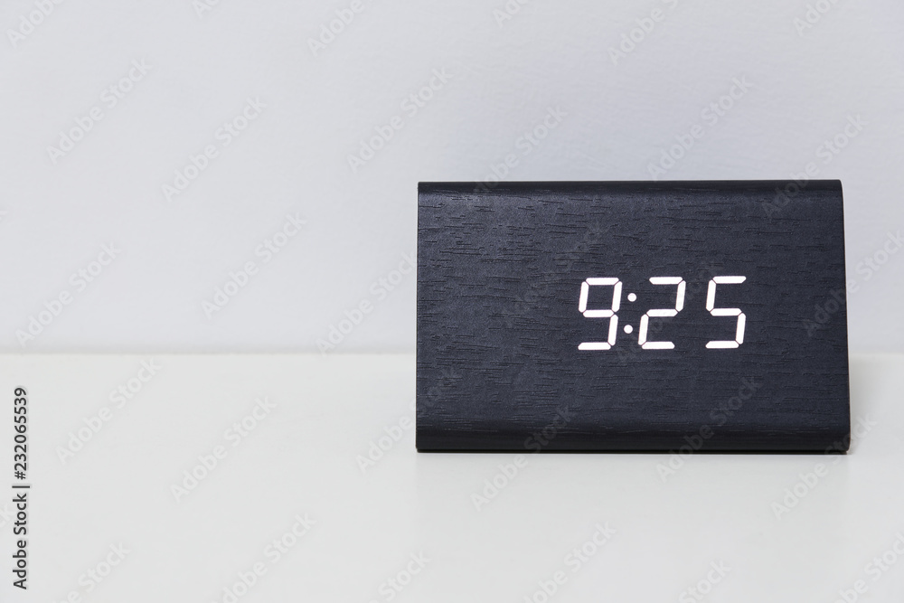 Black Digital Clock On A White Background Showing Time 9 25 Stock Photo Adobe Stock