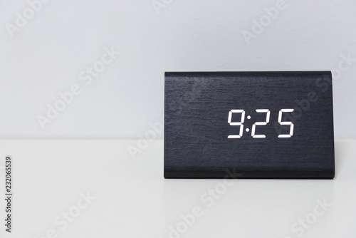Black Digital Clock On A White Background Showing Time 9 25 Stock Photo Adobe Stock