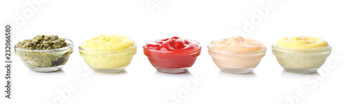 Wallpaper Mural Different tasty sauces in glass bowls on white background Torontodigital.ca