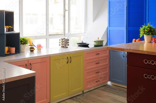 Interior of modern kitchen with stylish furniture