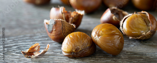 The Chestnut roasted and put on the wooden background