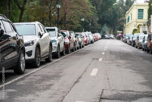 Cars parked on the urban street side