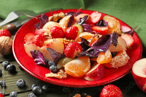 Fresh fruit salad with stra...