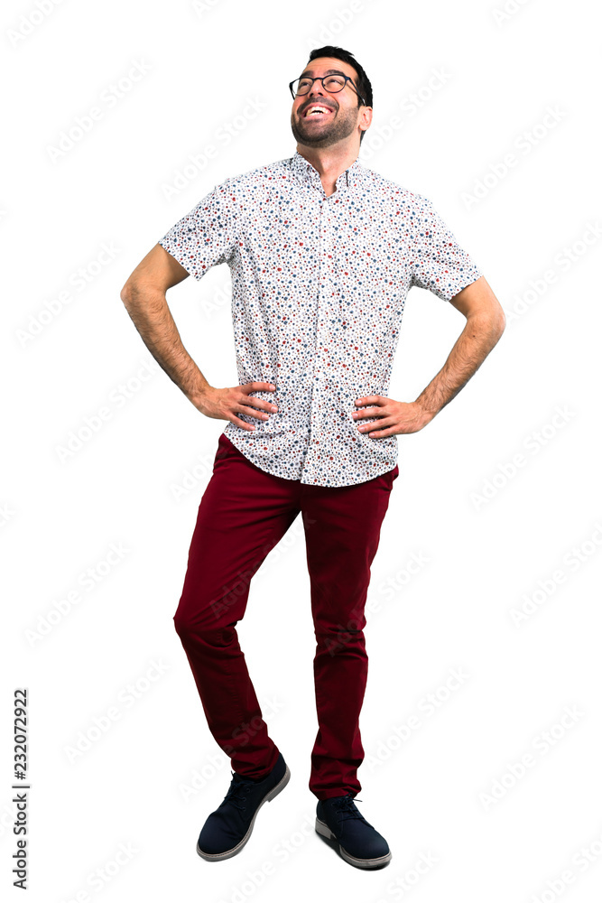 Handsome man with glasses posing with arms at hip Handsome man with glasses posing with arms at hip