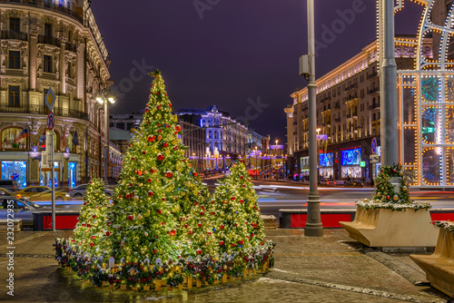 Night view of Tverskaya street and Manezhnaya Square in Moscow, Russia. Architecture and landmarks of Moscow. Moscow with Christmas decoration.