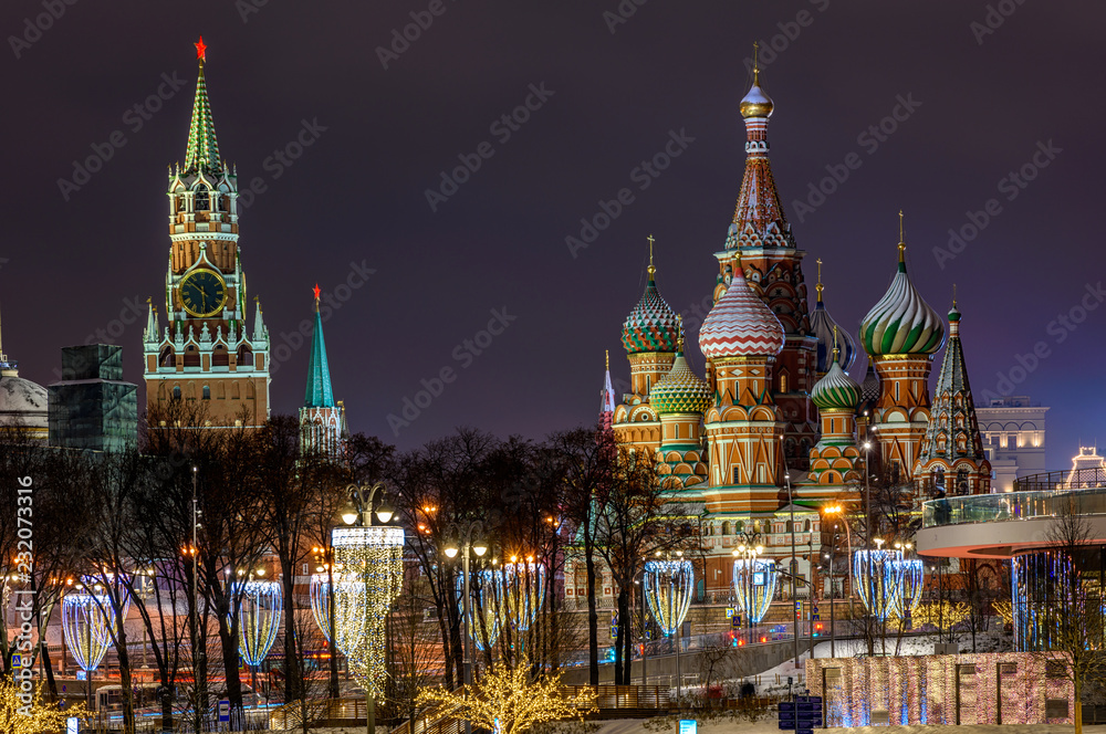 Spasskaya Tower, Moscow Kremlin and Saint Basil s Cathedral in Moscow, Russia. Architecture and landmarks of Moscow. Moscow with Christmas decoration. Spasskaya Tower, Moscow Kremlin and Saint Basil s Cathedral in Moscow, Russia. Architecture and landmarks of Moscow. Moscow with Christmas decoration.