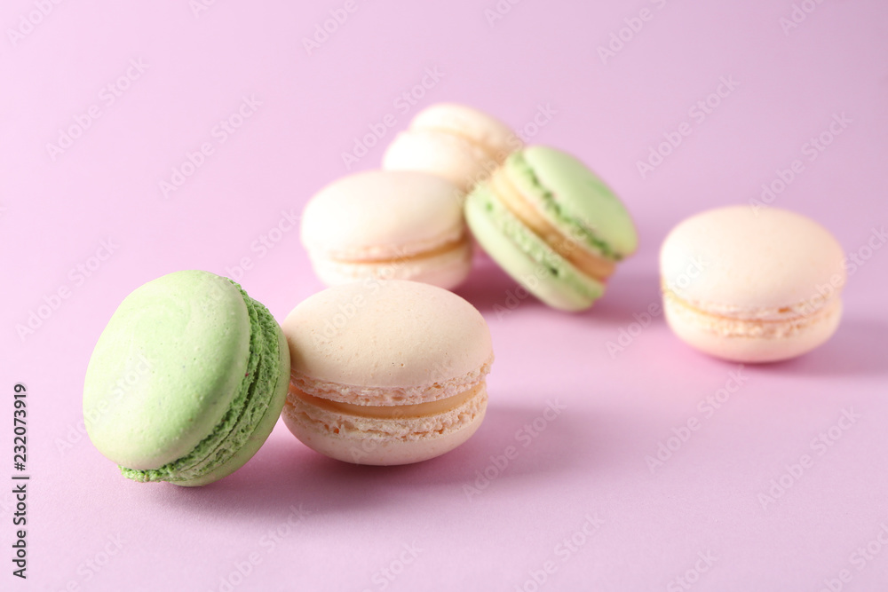 Fresh tasty macaroons on color background Fresh tasty macaroons on color background