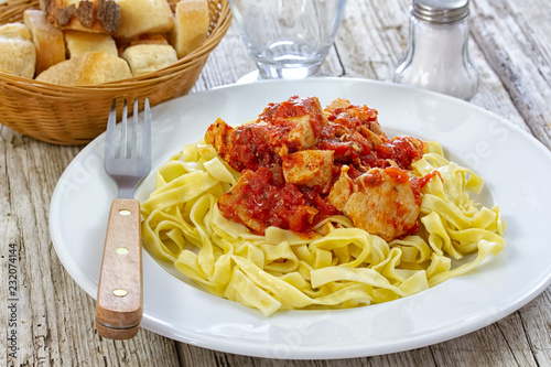 chicken, pasta with tomato sauce