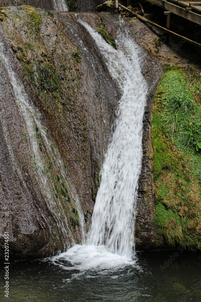 Waterfall in the mountains Waterfall in the mountains