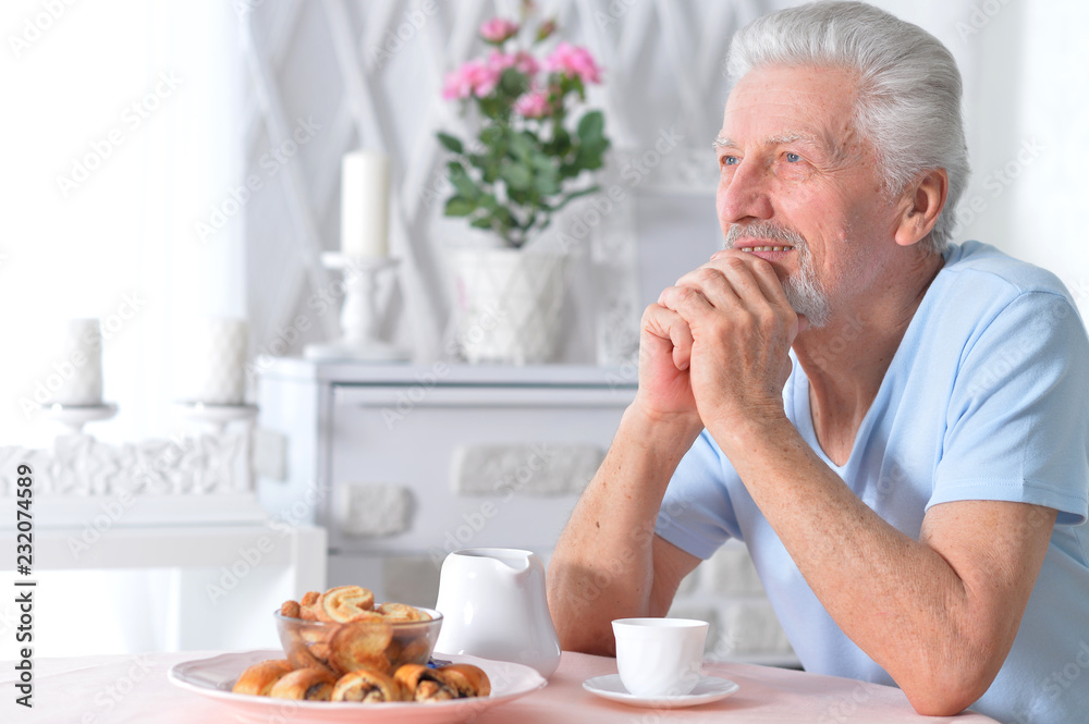 Portrait of a senior man having breakfast Portrait of a senior man having breakfast