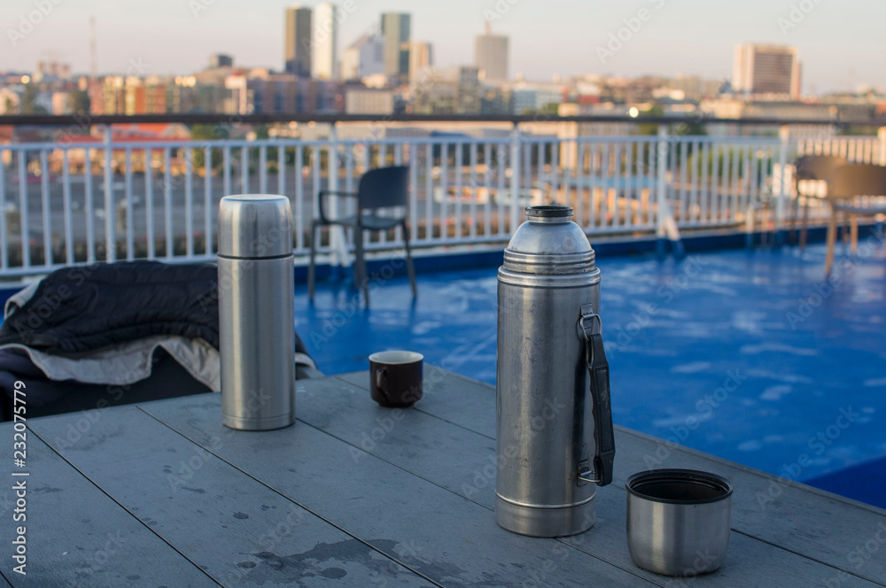 Fototapeta premium two thermos on the table