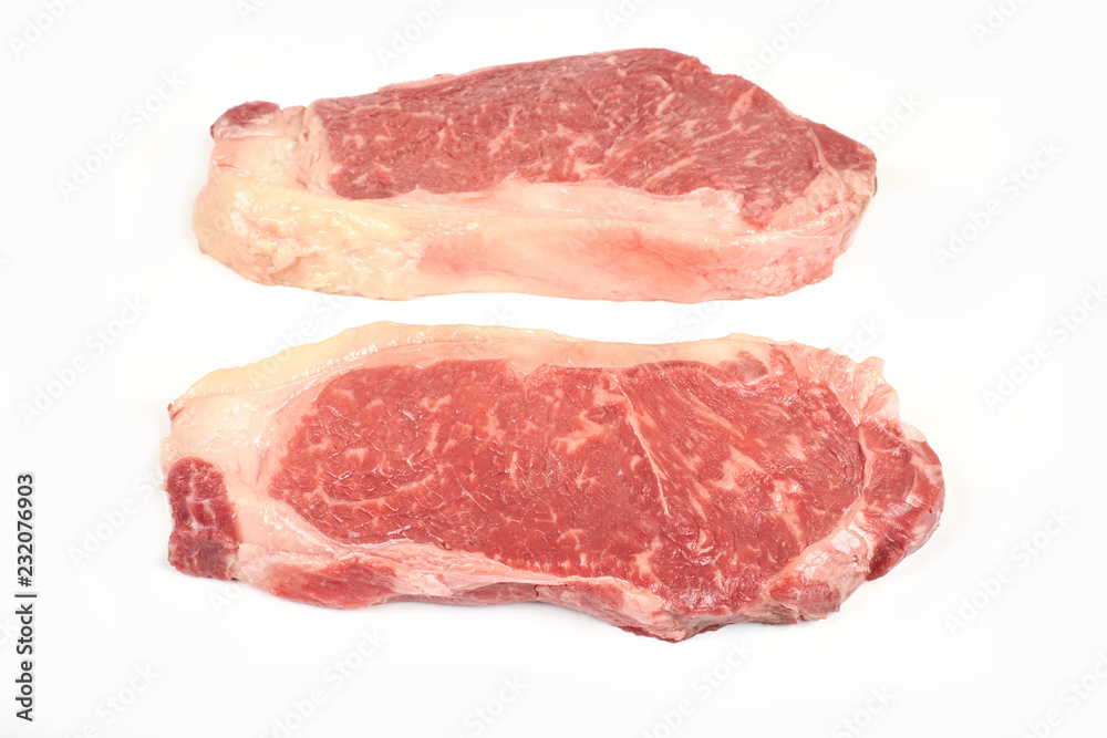 raw beef sirloin steak isolated on white background raw beef sirloin steak isolated on white background