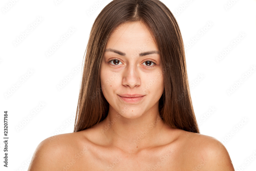 Portrait of young beautiful woman with no makeup on white background Portrait of young beautiful woman with no makeup on white background