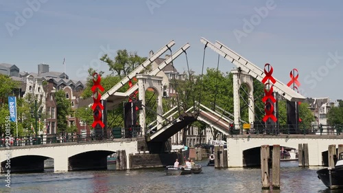 Channel ‘the Amstel;’ with the famous bridge ’Magere Brug’ Amsterdam photo