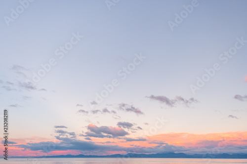 Fototapeta Naklejka Na Ścianę i Meble -  Beautiful cloudscape over the sea at sunset.