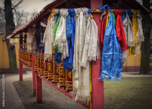 Prayer wheels at the yard of  Datsan Gunzechoinei. photo