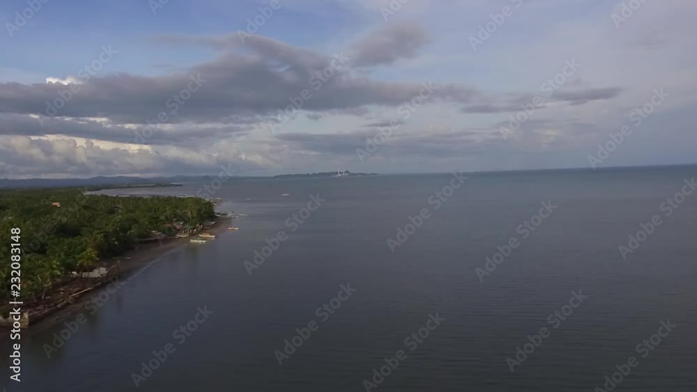 Empty sandy Beach and Beautiful Calm Sea On Cloudy Day, Drone aerial Empty sandy Beach and Beautiful Calm Sea On Cloudy Day, Drone aerial
