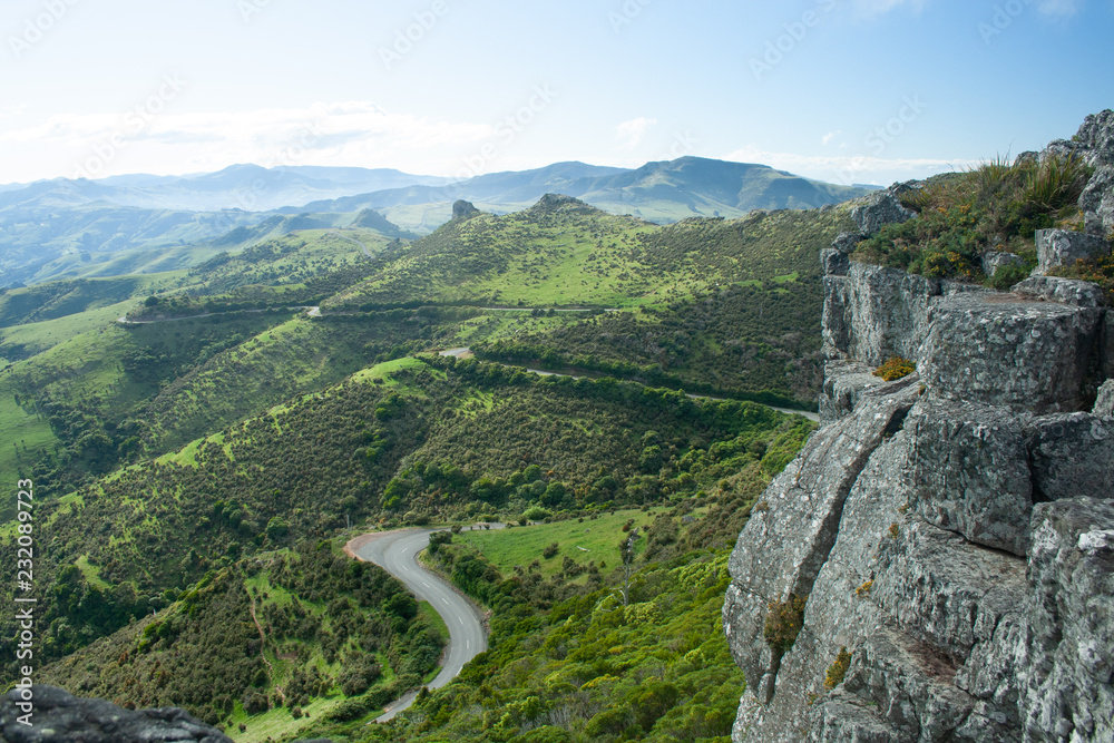 Obraz premium Banks Peninsula with winding road landscape, New Zealand