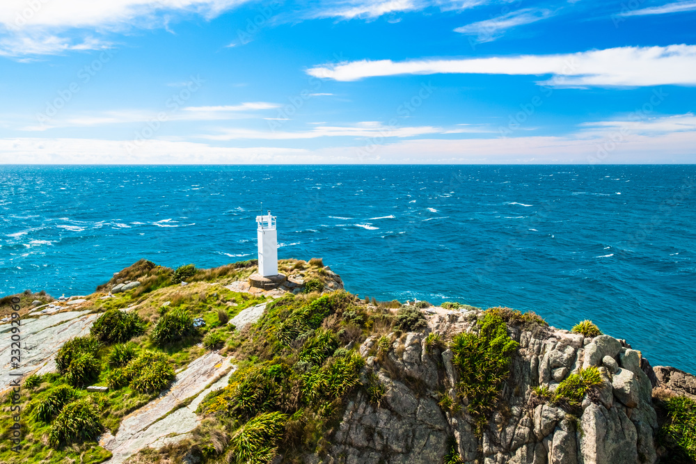 View of the lighthouse at Separation point.The coastline in Abel Tasman National Park, South Island, New Zealand.