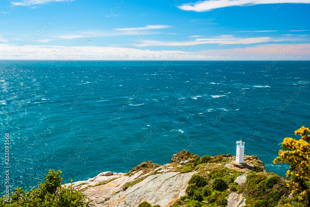 View of the lighthouse at Separation point.The coastline in Abel Tasman National Park, South Island, New Zealand.