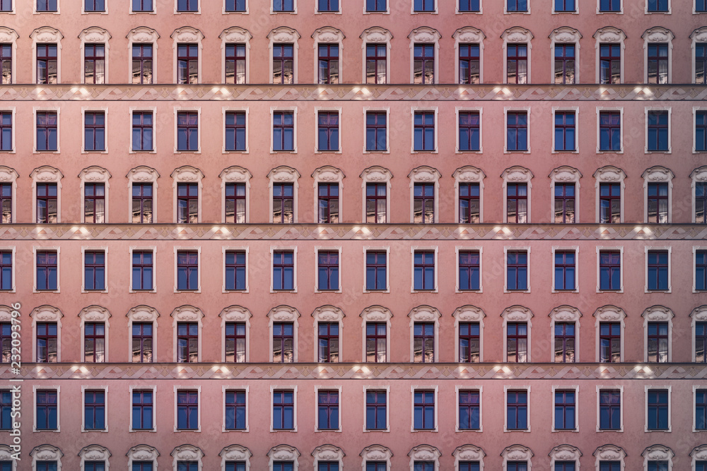 architectural pattern of an old pink house with stucco architectural pattern of an old pink house with stucco