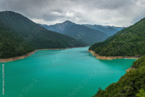 Inguri water reservoir with vibrant blue water