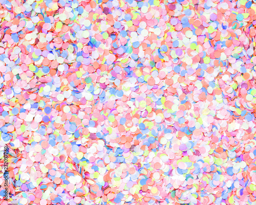 Confetti diversity light background, large size. Texture colored circles from paper, close-up. Basis for a festive design or a postcard. Carnival, abstract wedding or birthday backdrop photo