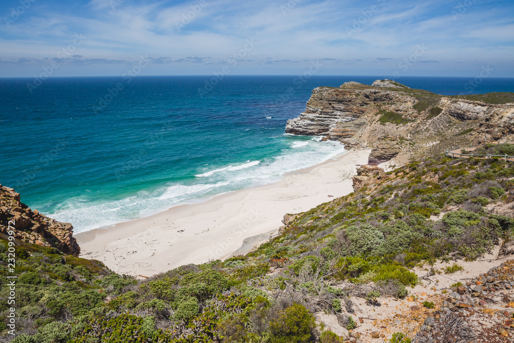 View of Diaz Beach in summer with blue water and waves View of Diaz Beach in summer with blue water and waves