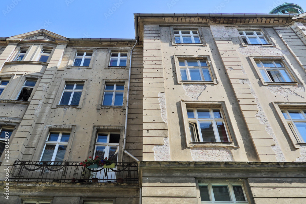 Obraz premium Berlin, Germany. Bullet impacts on a facade at the Jewish Quarter