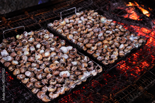 Fototapeta Naklejka Na Ścianę i Meble -  caragols a la llauna, catalan recipe of snails