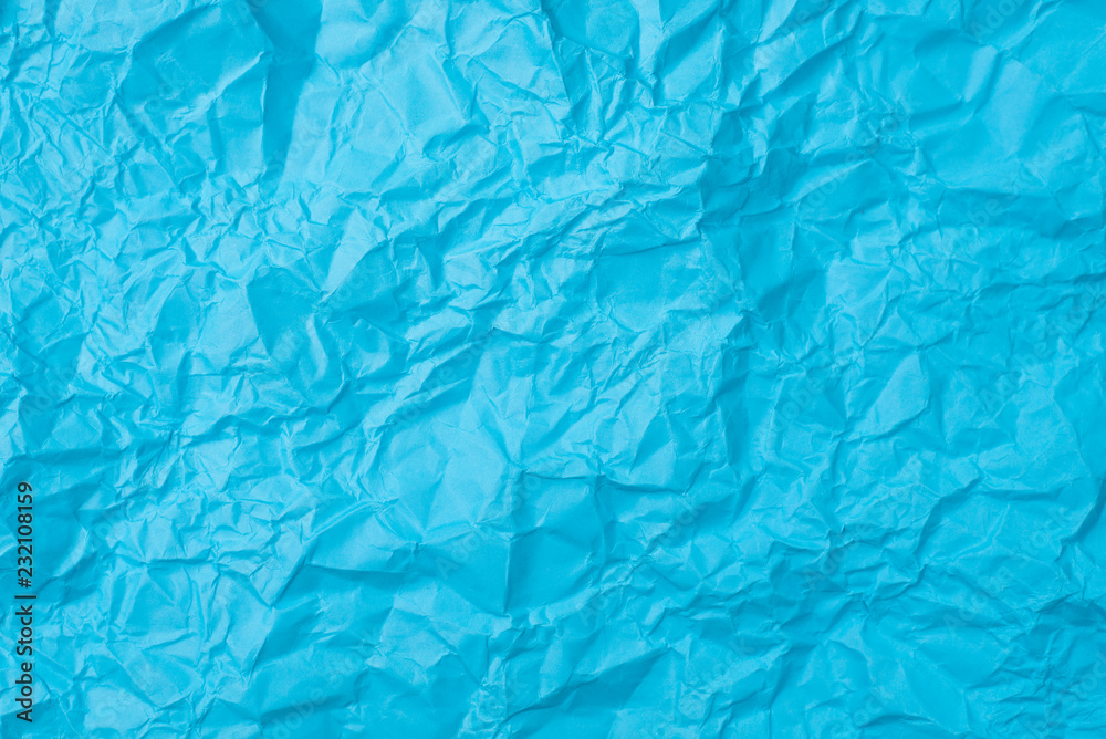 Obraz premium blue crumpled paper texture as background. concept of school, abstract and stress