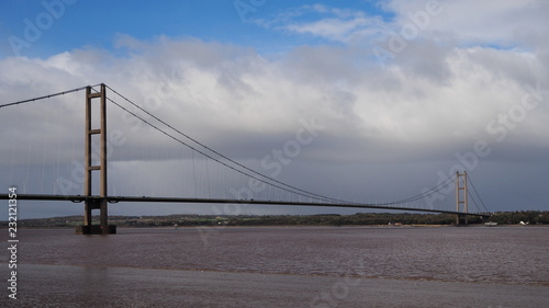 Humber Bridge, a single span suspension bridge spanning the River Humber, viewed from Barton-on-Humber, Lincolnshire looking back towards Hessle, Yorkshire, UK © Phil