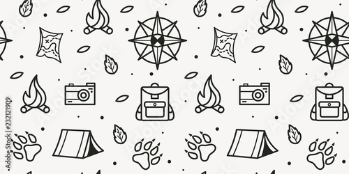 Vector seamless pattern of compass, paws, backpack, tent, bonfire, camera, map for tourist symbol