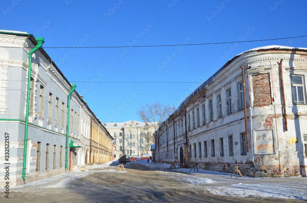 Russia, Arkhangelsk, old houses in Bankovsky lane. Bankovsky lane, building 2 on the right is Commercial Bank of 18-19 centuries