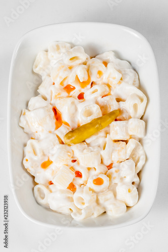 Pasta Sauced with Yoghurt and Garlic Served with Picle photo