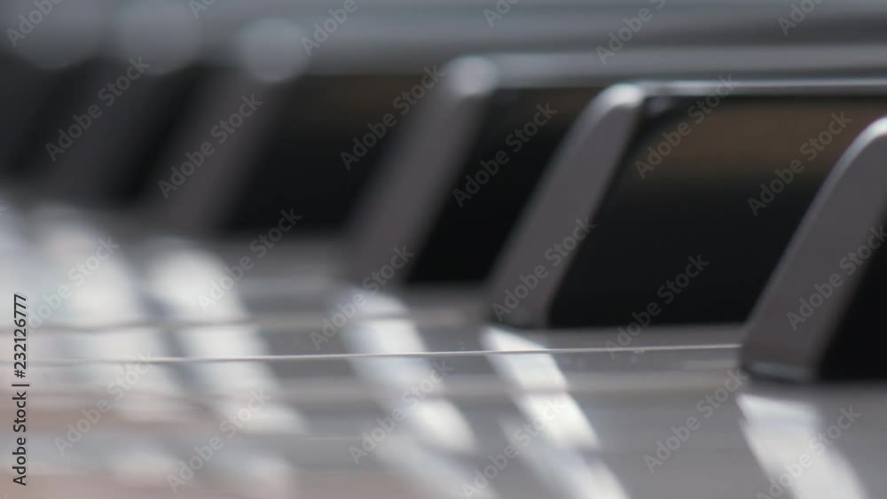 Slow tracking over piano keys Slow tracking over piano keys
