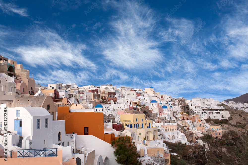 Panoramic view of Oia town at sunset, Santorini island, Cyclades, Greece
