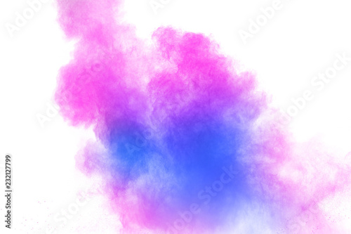 Bizarre forms of blue pink powder explosion on white background.