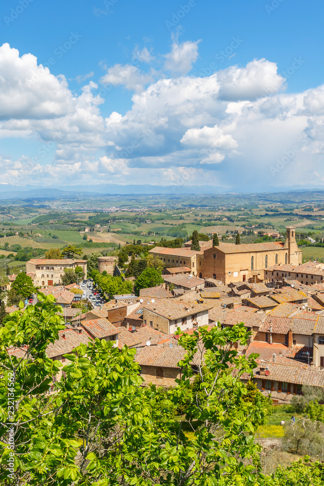 View of San Gimignano and a rural landscape view in Tuscany, Italy