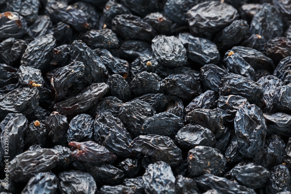 Black Raisin texture, popular dried fruit. Dried grapes. Black Raisin texture, popular dried fruit. Dried grapes.