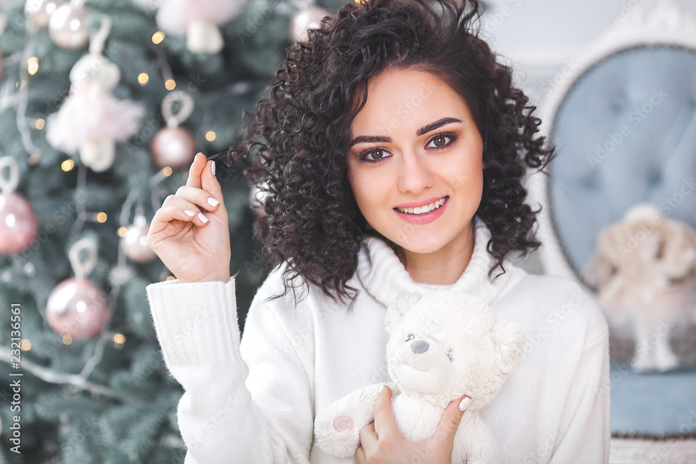 Close up portrait of attractive woman on Christmas background Close up portrait of attractive woman on Christmas background