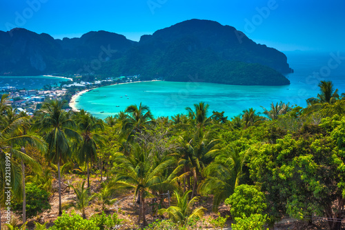 Fototapeta Naklejka Na Ścianę i Meble -  Beautiful panoramic view over Tonsai and Dalum Beach. Green jungles and hot stones on the bright sun of tropical island and the mountains in Andaman Sea. Phi Phi Viewpoint, Krabi, Thailand.