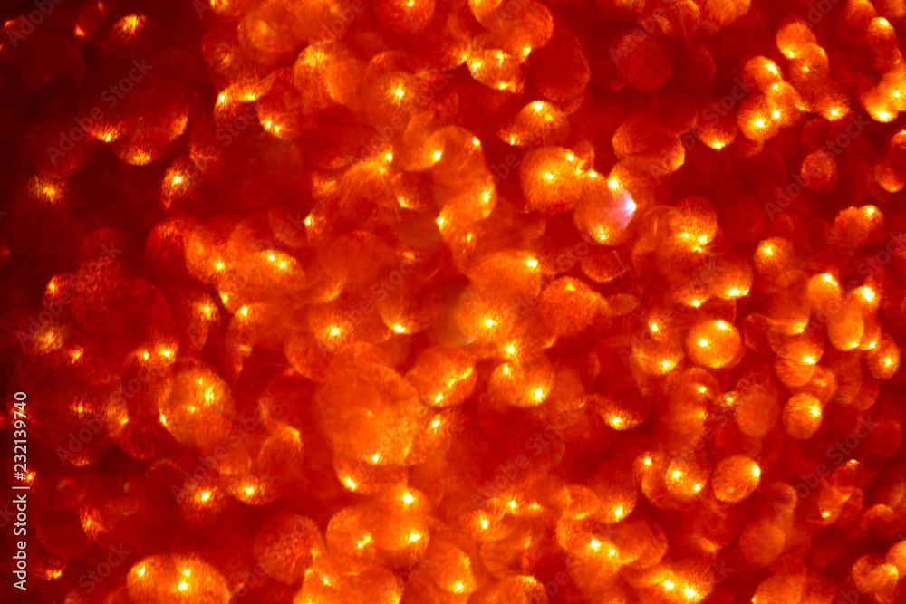 Abstract bokeh background. Christmas Brilliant red background. The concept of Christmas and New Year's holiday. Blurred, abstract, cropped shot. Abstract bokeh background. Christmas Brilliant red background. The concept of Christmas and New Year's holiday. Blurred, abstract, cropped shot.