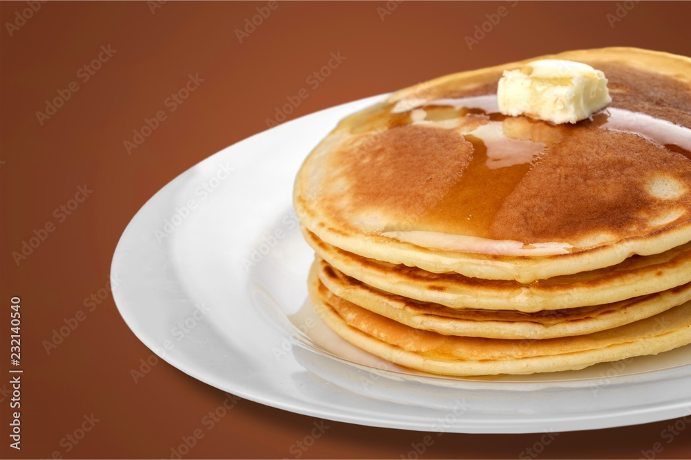 Stack of Small pancakes in syrup Stack of Small pancakes in syrup