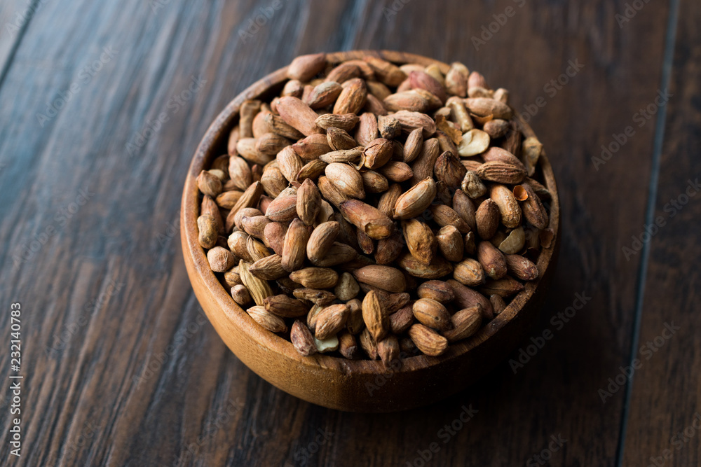 Organic Pistachio Nuts Without Shell in Wooden Bowl. Organic Pistachio Nuts Without Shell in Wooden Bowl.
