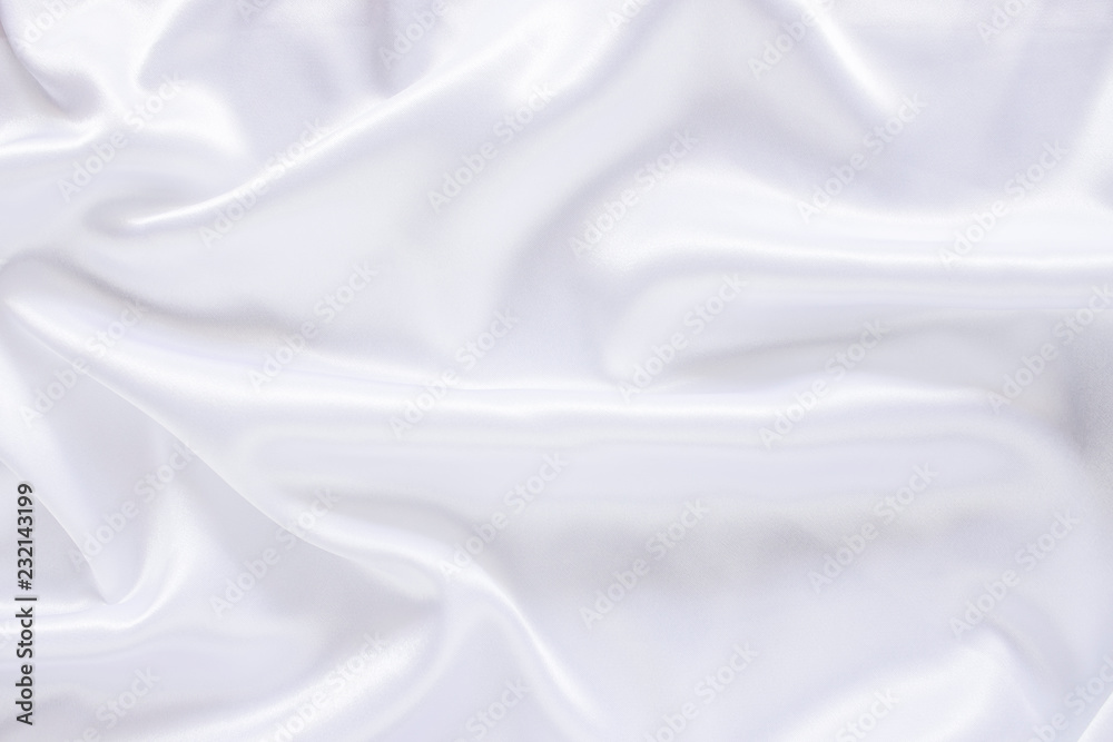 White cloth background abstract with soft waves.