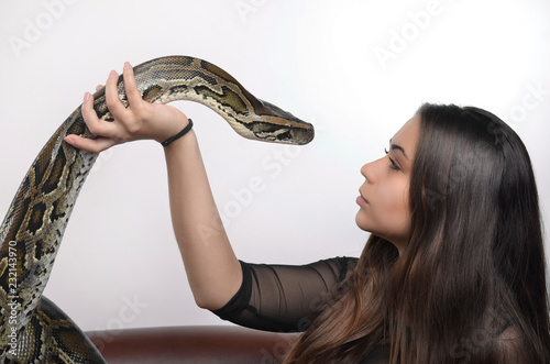 beautiful sensual woman and python.