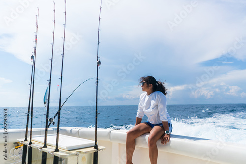 Woman Relaxing on Fishing Boat